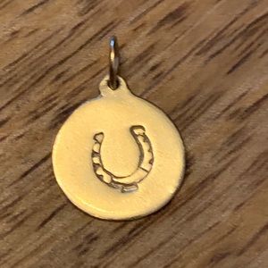 Gold horseshoe charm